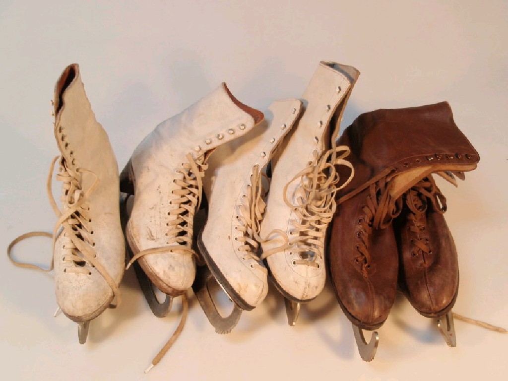 Appraisal: Three pairs of vintage ice skates