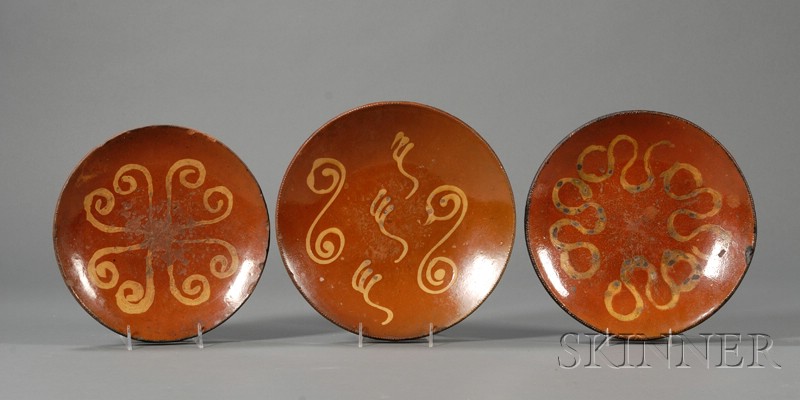 Appraisal: Three Large Redware Slip-decorated Plates America early th century round