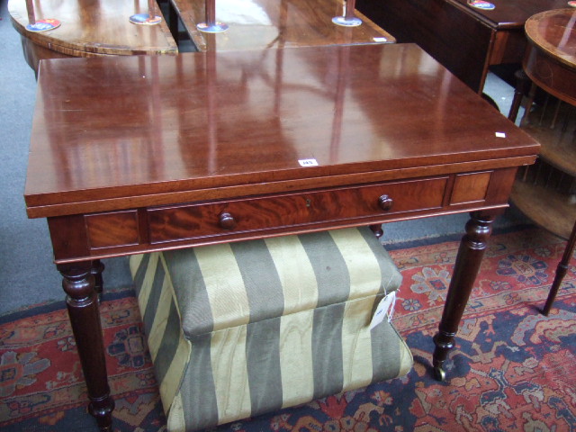 Appraisal: An early Victorian mahogany draw-leaf table the rectangular top over