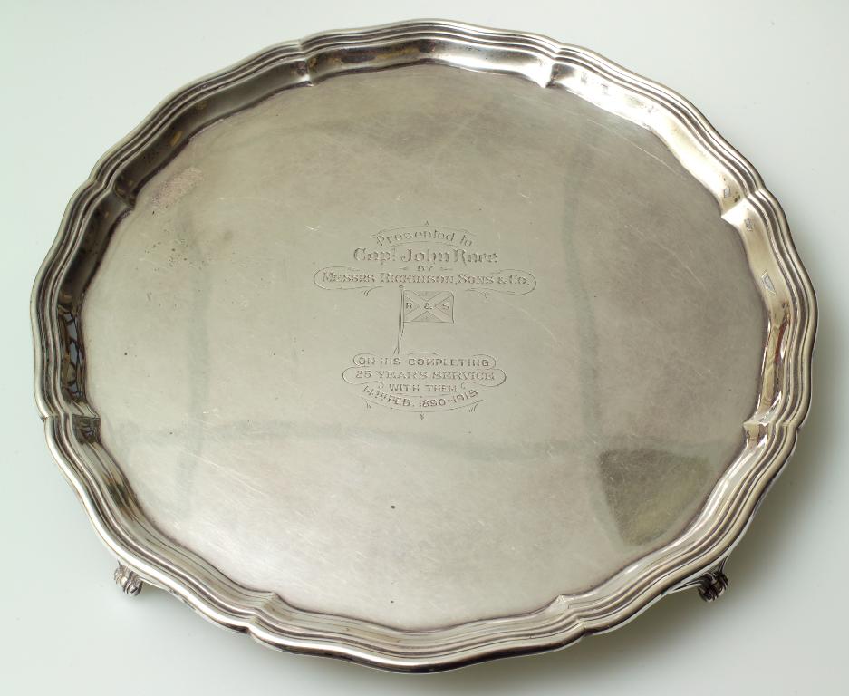 Appraisal: GEORGE V SILVER SALVER LONDON of circular form with scalloped