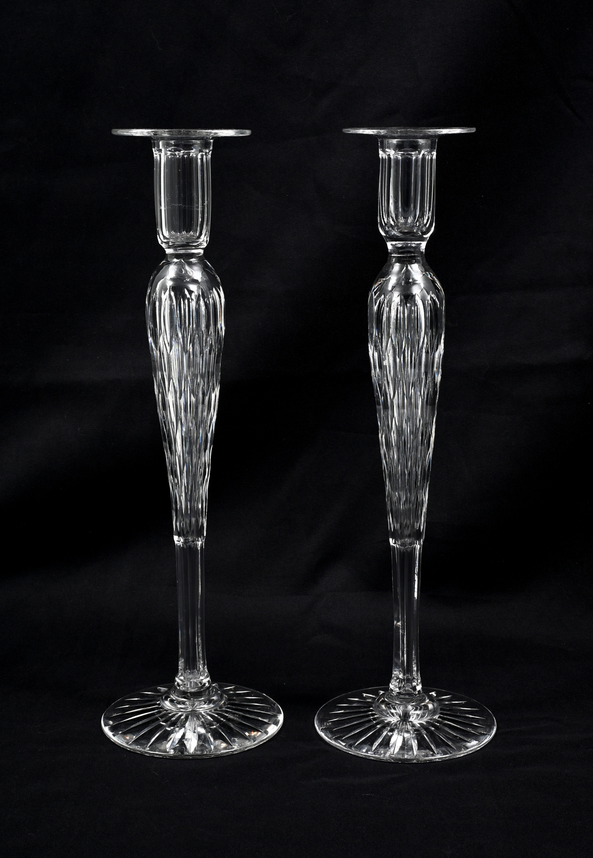 Appraisal: BEAUTIFUL PAIR OF CRYSTAL CANDLESTICKS Tall crystal candlesticks having a