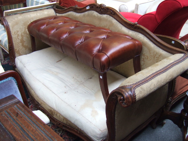 Appraisal: An early th century stained beech sofa the carved and