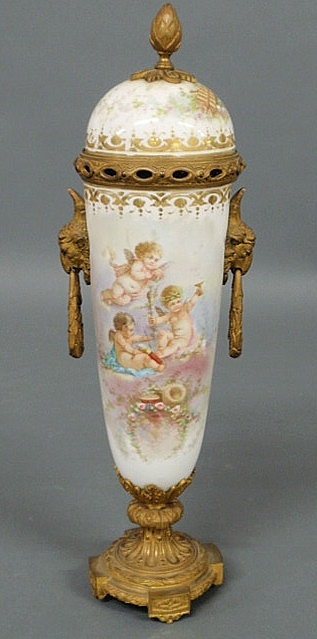 Appraisal: Sevres porcelain covered urn c with putti scene signed Sebrun