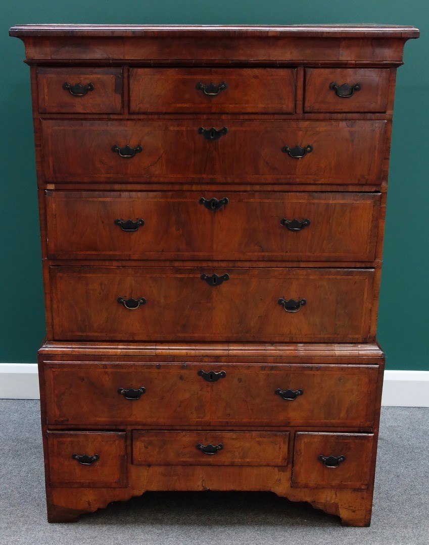 Appraisal: An early th century and later figured walnut chest on