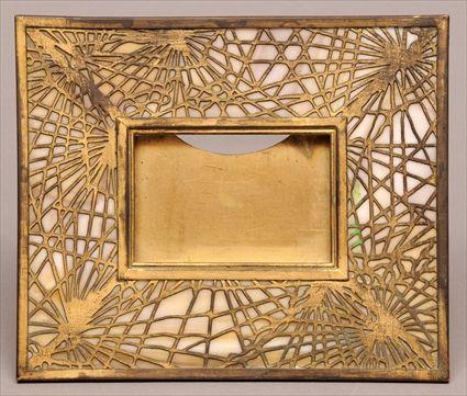 Appraisal: TIFFANY STUDIOS GILT-BRONZE AND CARAMEL SLAG GLASS 'PINE NEEDLE' PATTERN