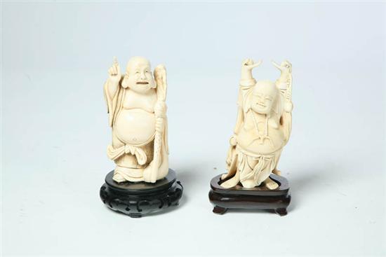 Appraisal: TWO IVORY CARVINGS Asian th century Two standing Buddhas one