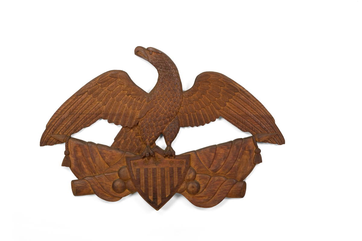 Appraisal: AMERICAN FOLK CARVED AND STAINED PINE EAGLE PLAQUE Depicted with