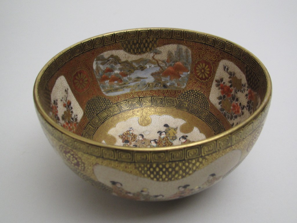 Appraisal: A Satsuma bowl painted with panels of figures landscapes and