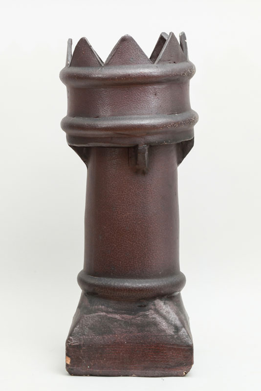 Appraisal: CONTINENTAL DARK BROWN-GLAZED STONEWARE CHIMNEY POT With crenelated cylindrical top