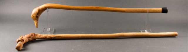 Appraisal: Two Cherry Carved Canes One of hand-carved duck with glass