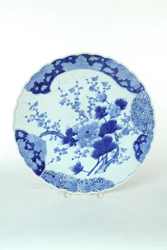 Appraisal: CHARGER Asian th century porcelain Hand decorated blue flowers ''d