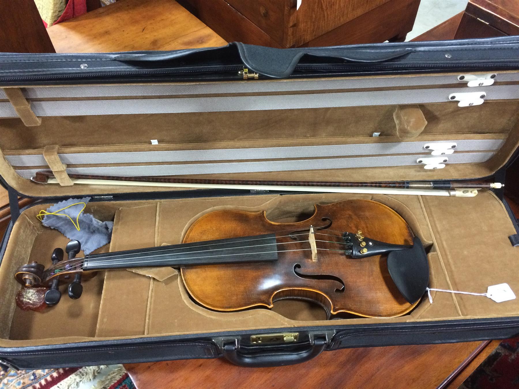 Appraisal: UNSIGNED VIOLIN European late th-early th century Carved scroll ebony