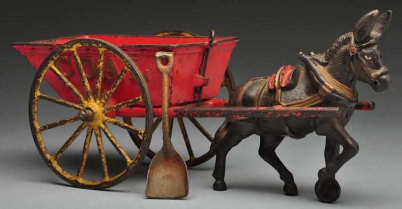 Appraisal: Cast Iron Ives Coal Wagon Donkey-Drawn Toy Description American Large