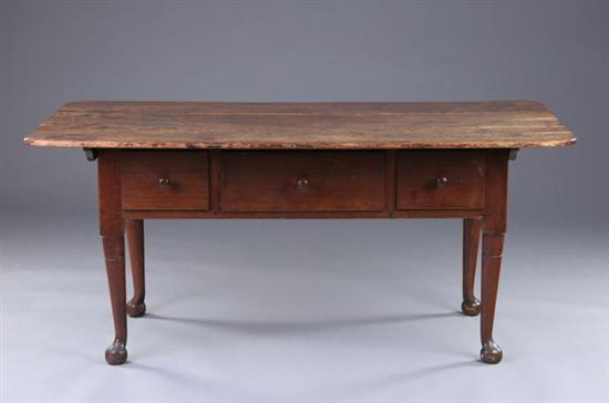 Appraisal: PENNSYLVANIA WALNUT KITCHEN TABLE early th century Three plank-board surface