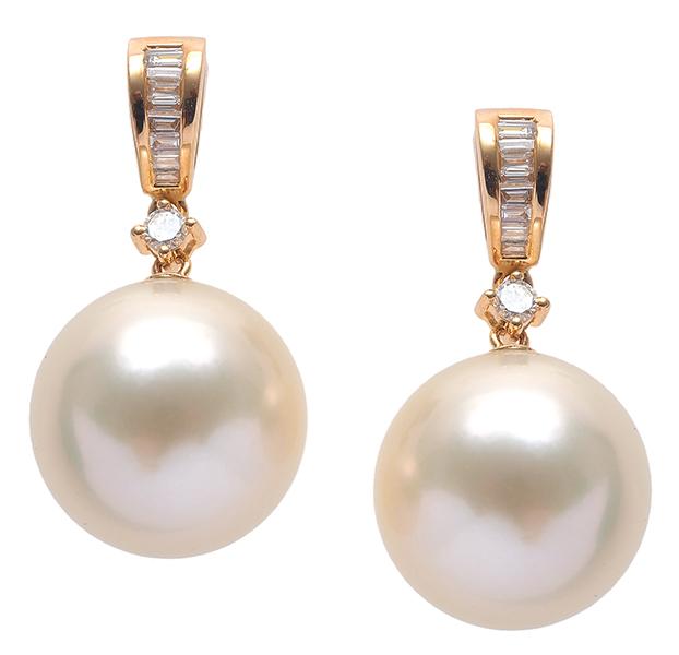 Appraisal: A PAIR OF SOUTH SEA PEARL AND DIAMOND EARRINGS Each