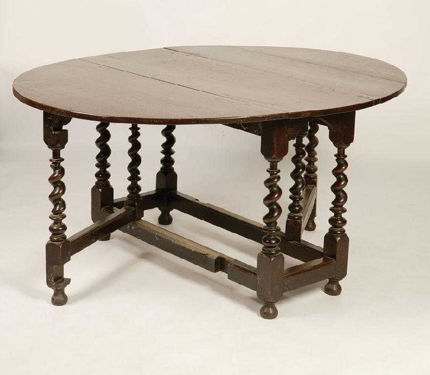 Appraisal: A CHARLES II OAK GATELEG DINING TABLE the oval top