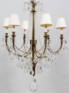 Appraisal: SIX-LIGHT BRASS AND CRYSTAL CHANDELIER H DIA Featuring brass scroll