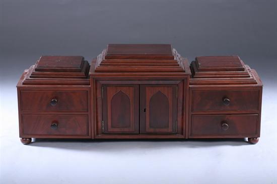 Appraisal: ENGLISH REGENCY MAHOGANY TABLE-TOP CABINET Early th century Stepped molded-edge