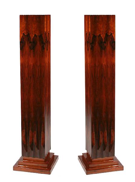 Appraisal: A pair of Art Deco fluted rosewood pedestals height ft