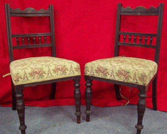 Appraisal: A set of six Edwardian walnut chairs the carved crests