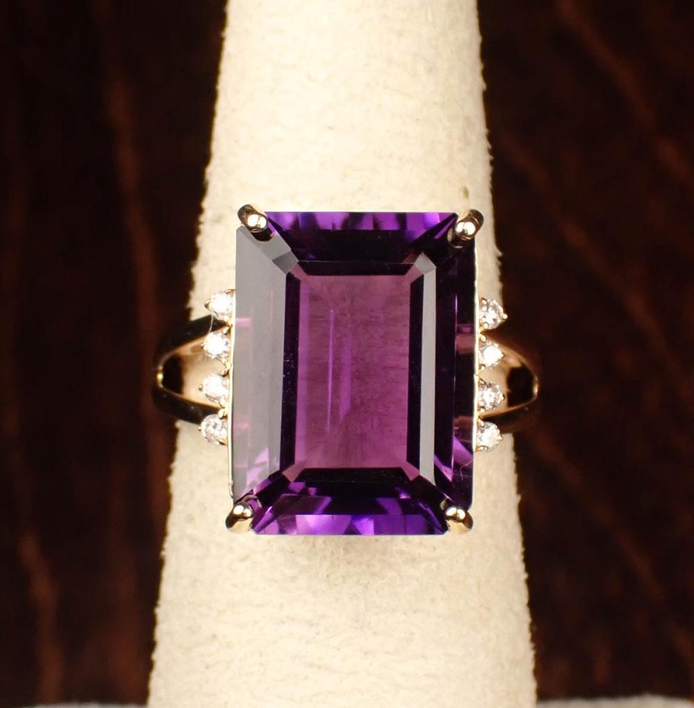 Appraisal: AMETHYST DIAMOND AND FOURTEEN KARAT GOLD RING The yellow gold