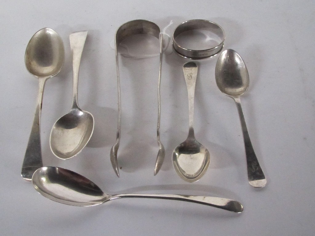 Appraisal: Lot comprising five silver spoons silver tongs and a napkin