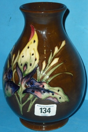 Appraisal: Moorcroft Vase Decorated in the Arun Lily design on brown