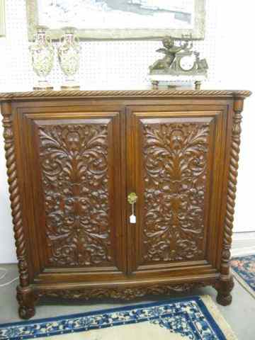 Appraisal: Large Mahogany Silverware Cabinet ornate carved doors open to reveal