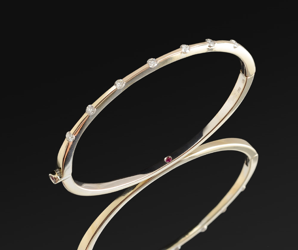 Appraisal: K ITALIAN HIDDEN RUBY BANGLE BRACELET WITH DIAMONDS Attrib Roberto