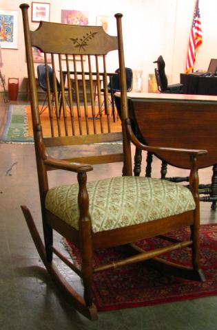 Appraisal: th Century rocking chair with arrow spindle back padded upholstered