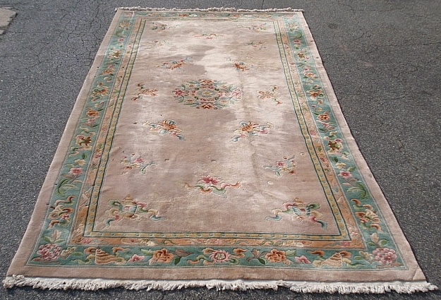 Appraisal: - Palace size Chinese style oriental carpet with taupe field