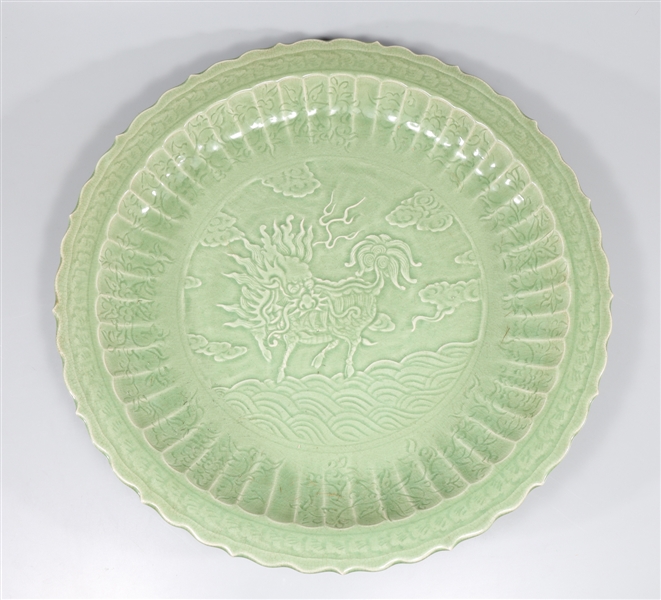 Appraisal: Massive Chinese celadon glazed ceramic charger the interior with molded