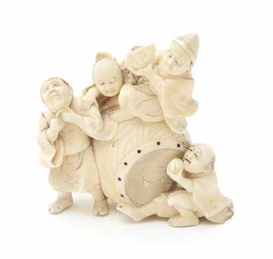 Appraisal: An Ivory Okimono of Four Children two eating fruit one