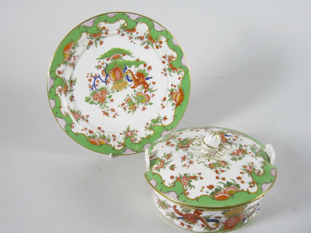 Appraisal: A Coalport Butter Tub Cover and Stand painted oriental flowering