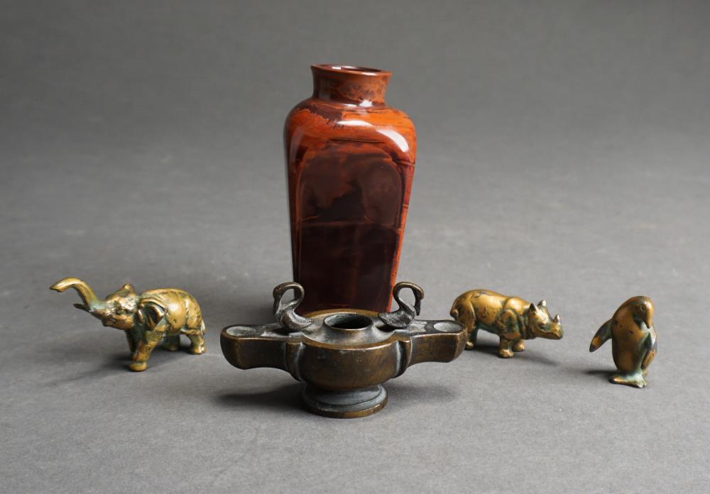 Appraisal: THREE GILT METAL MINIATURE ANIMAL FIGURES AN ARCHAIC STYLE BRONZE