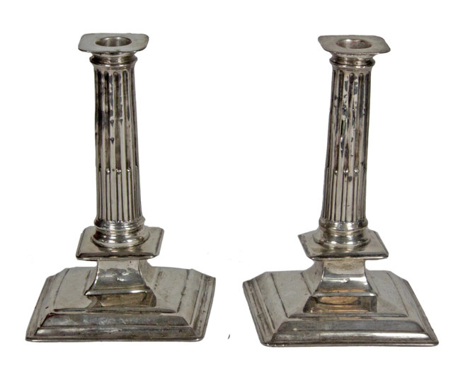 Appraisal: A pair of late th Century silver candlesticks marks rubbed