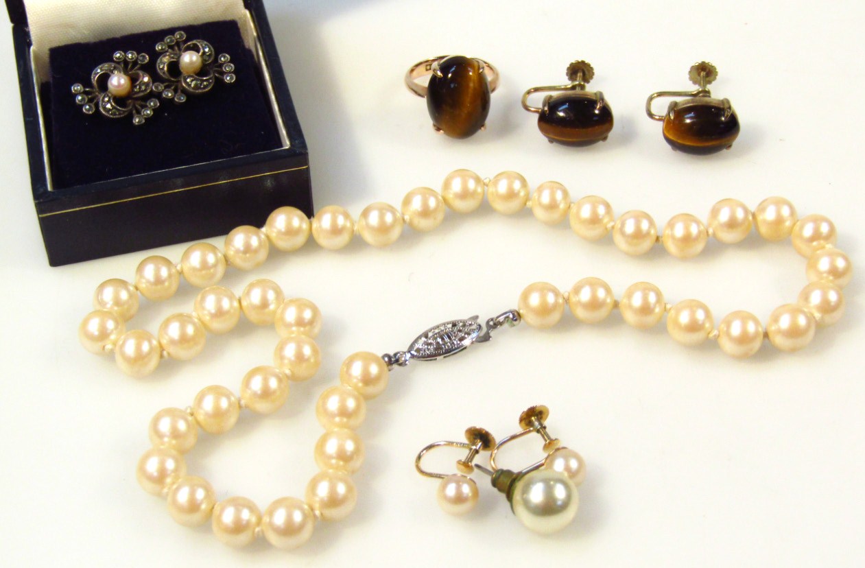 Appraisal: A faux pearl child's necklace cm long and a pair