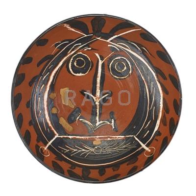 Appraisal: PABLO PICASSO - MADOURA Glazed faience bowl with head France