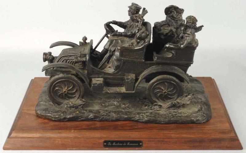 Appraisal: Large Signed Open Air Automobile Bronze Description Titled LA Machine