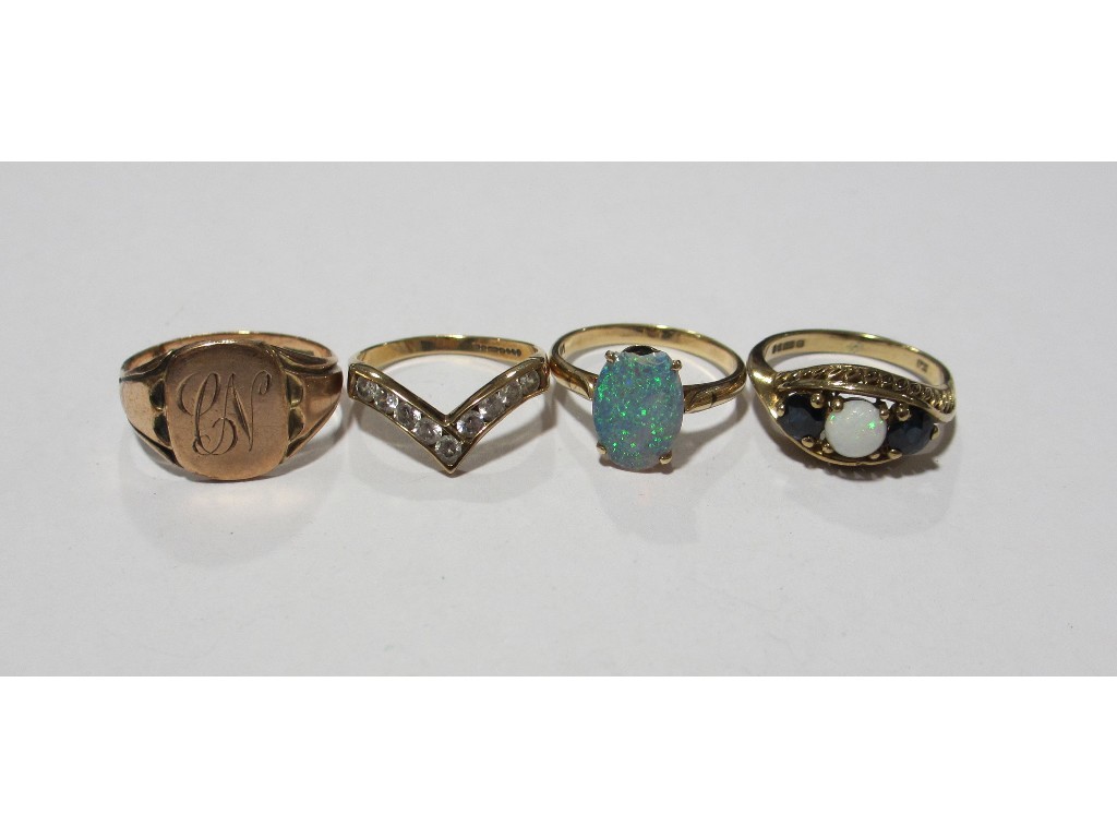 Appraisal: Lot comprising three ct gold rings to include sapphire and