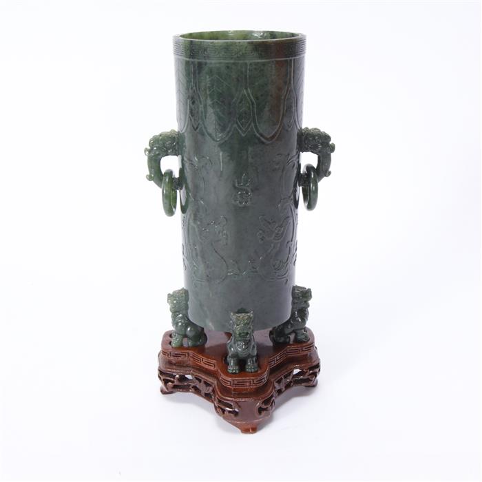 Appraisal: Chinese spinach jade cylindrical vase with relief carved dragon motif