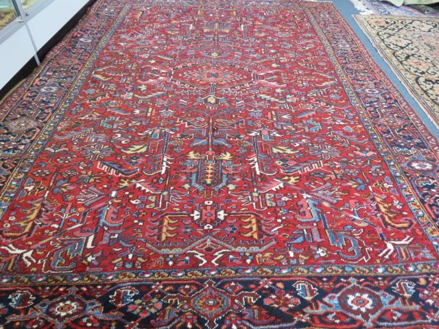 Appraisal: Heriz Persian Handmade Room Size Rug interesting geometrics red field