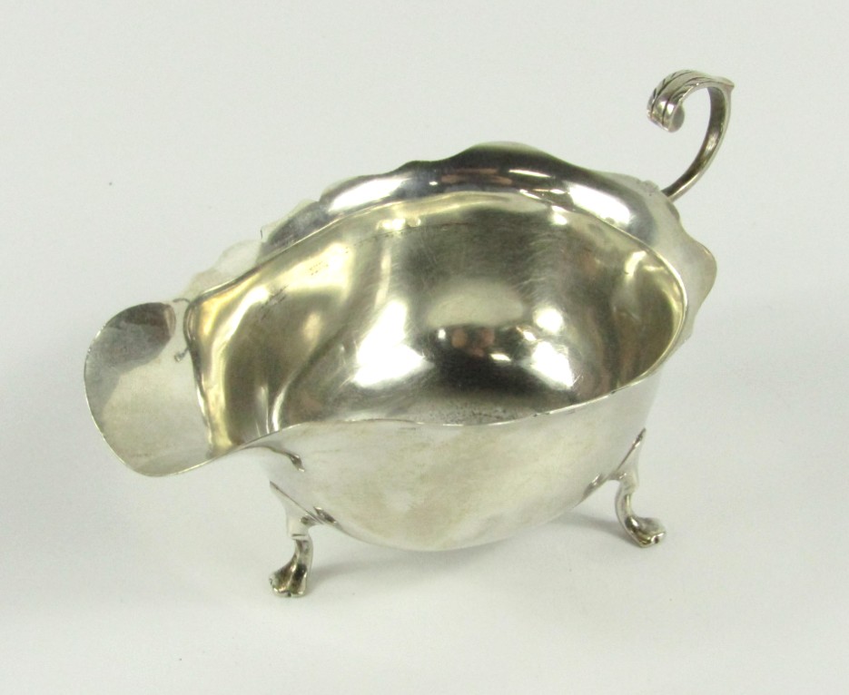 Appraisal: A George V sauce boat of plain Georgian design with