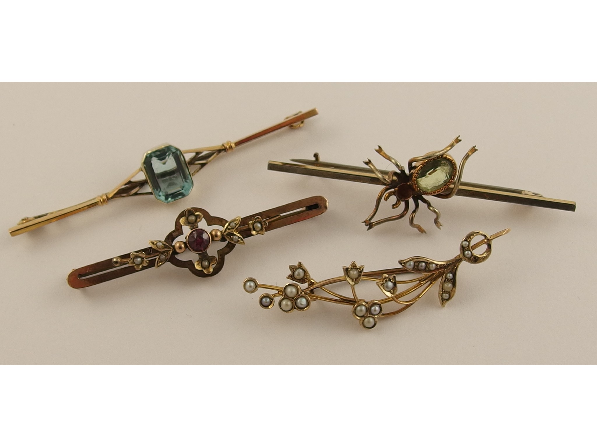 Appraisal: Three ct pearl and gem set brooches and a yellow