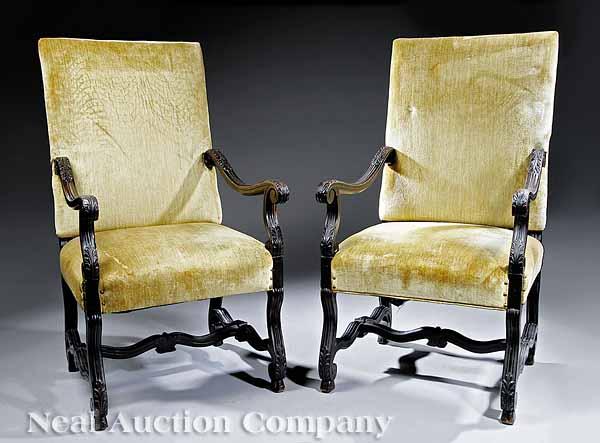 Appraisal: A Pair of Louis XIV-Style Carved Walnut Armchairs th c