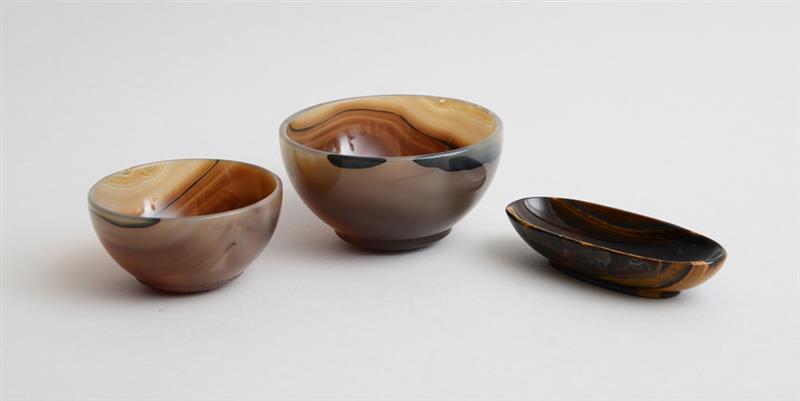 Appraisal: TWO CARVED AGATE BOWLS AND A CAT'S EYE OVAL DISH