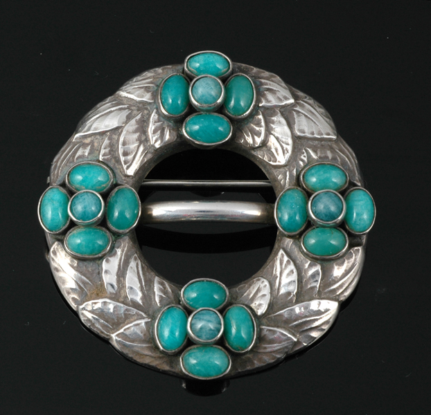 Appraisal: A GEORG JENSEN SILVER AND AMAZONITE CIRCULAR BROOCH The wreath