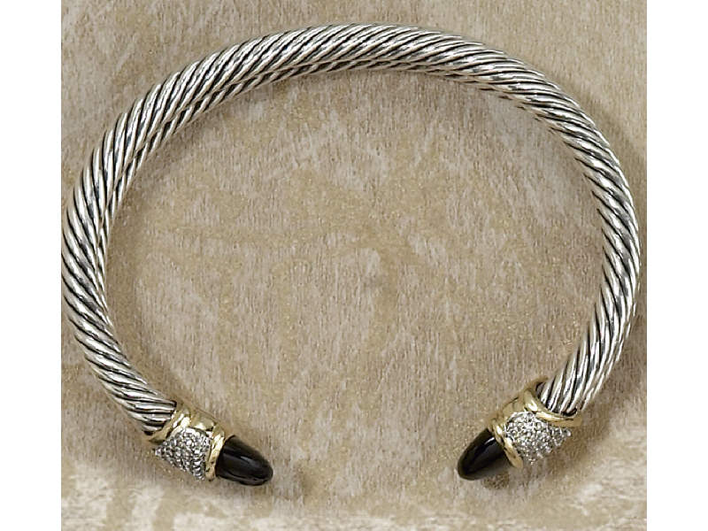 Appraisal: DAVID YURMAN BRACELET Sterling and k yellow gold with onyx