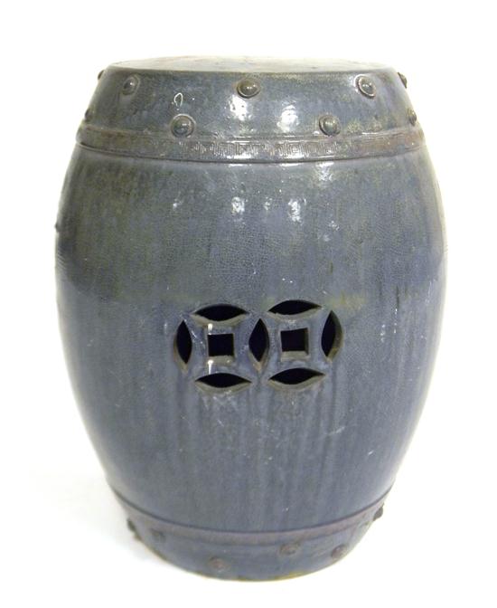 Appraisal: th C Chinese garden stool dark blue mottled glaze throughout