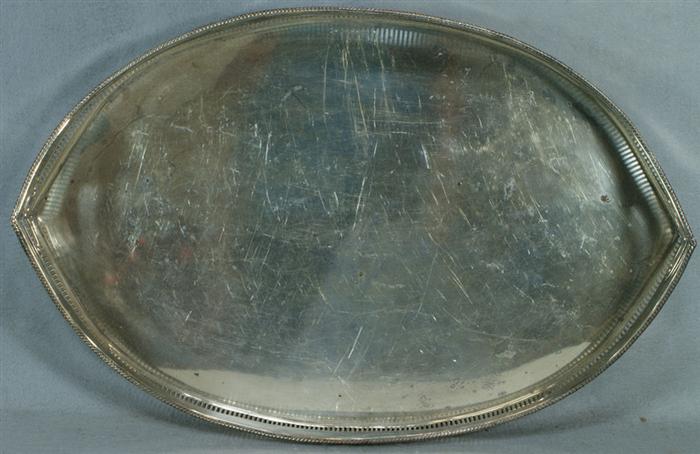 Appraisal: Elliptical plated silver tray with pierced gallery and handles on